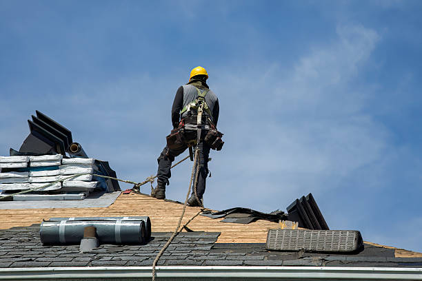 Professional Roofing technician working in Auburn, MI